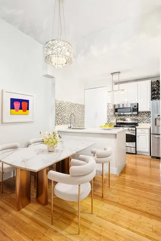 $995,000 | 393 West 49th Street, Unit TH1 | Hell's Kitchen