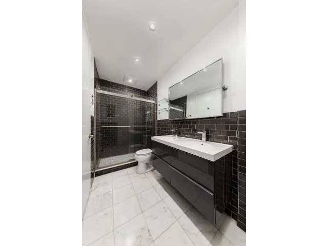 $995,000 | 393 West 49th Street, Unit TH1 | Hell's Kitchen