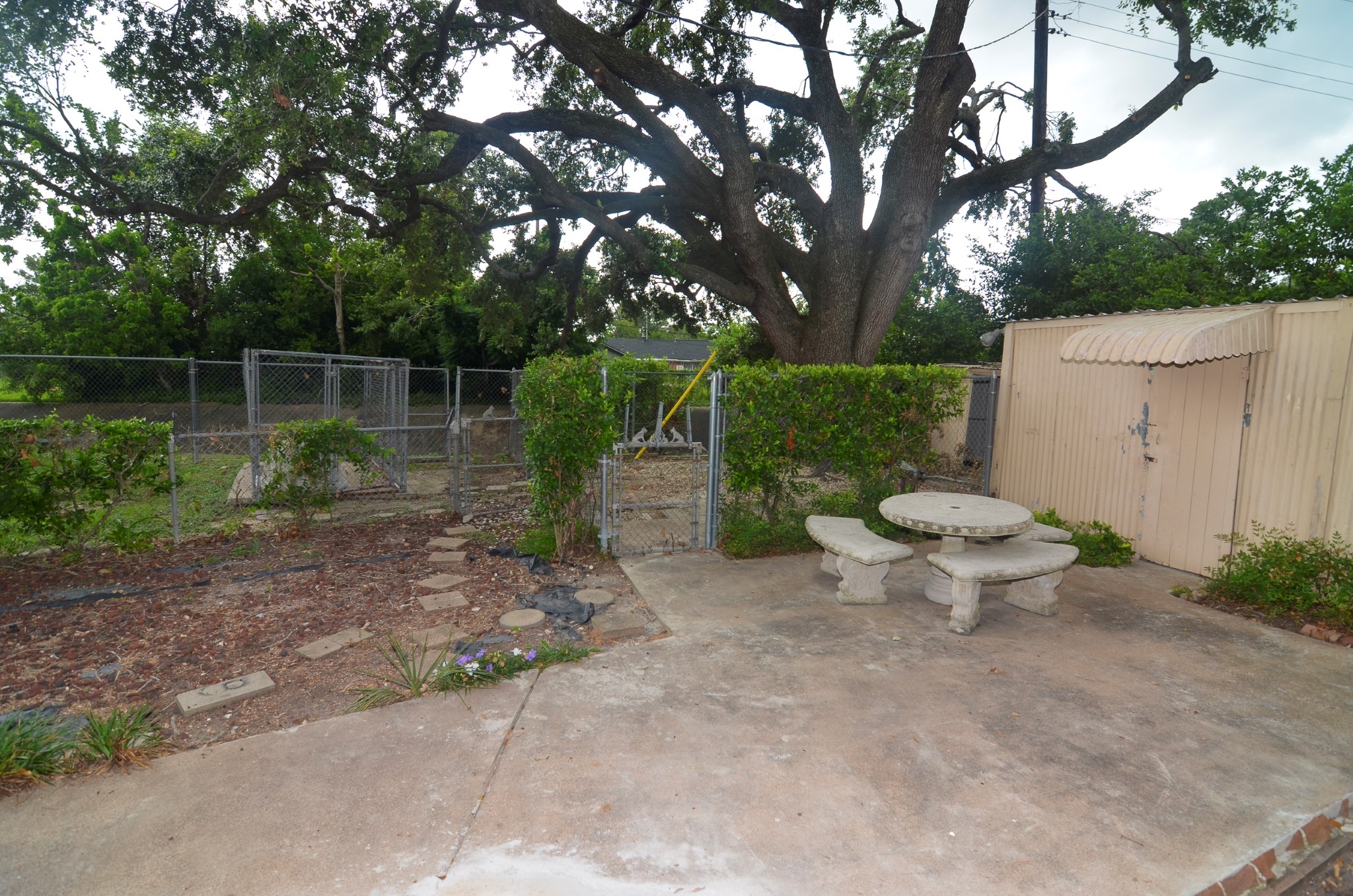 4101 Philco Drive Houston, TX 77080 - Photo 15 of 23 a backyard of a house with outdoor seating