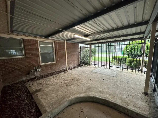 a view of a backyard of the house