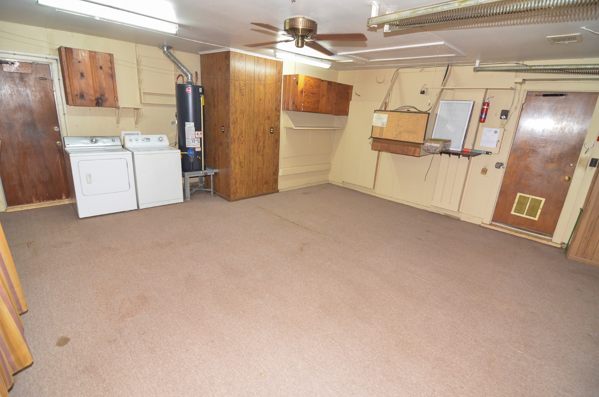 4101 Philco Drive Houston, TX 77080 - Photo 9 of 23 a view of a storage & utility room with refrigerator and washer