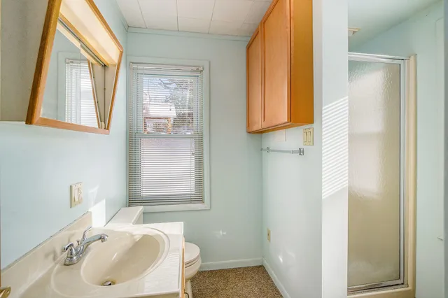 $265,000 | 66 Cedar Lake Road, Chelsea, MI 48118