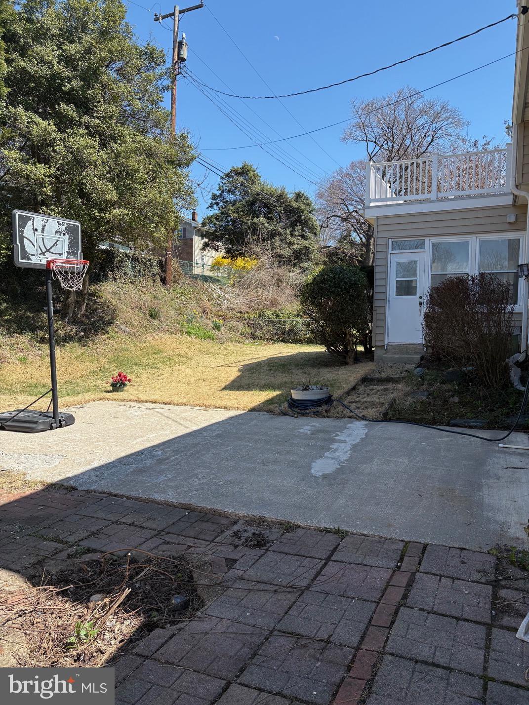 1920 Rollingwood Road Baltimore, MD 21228 - Photo 5 of 6 Sunny backyard.