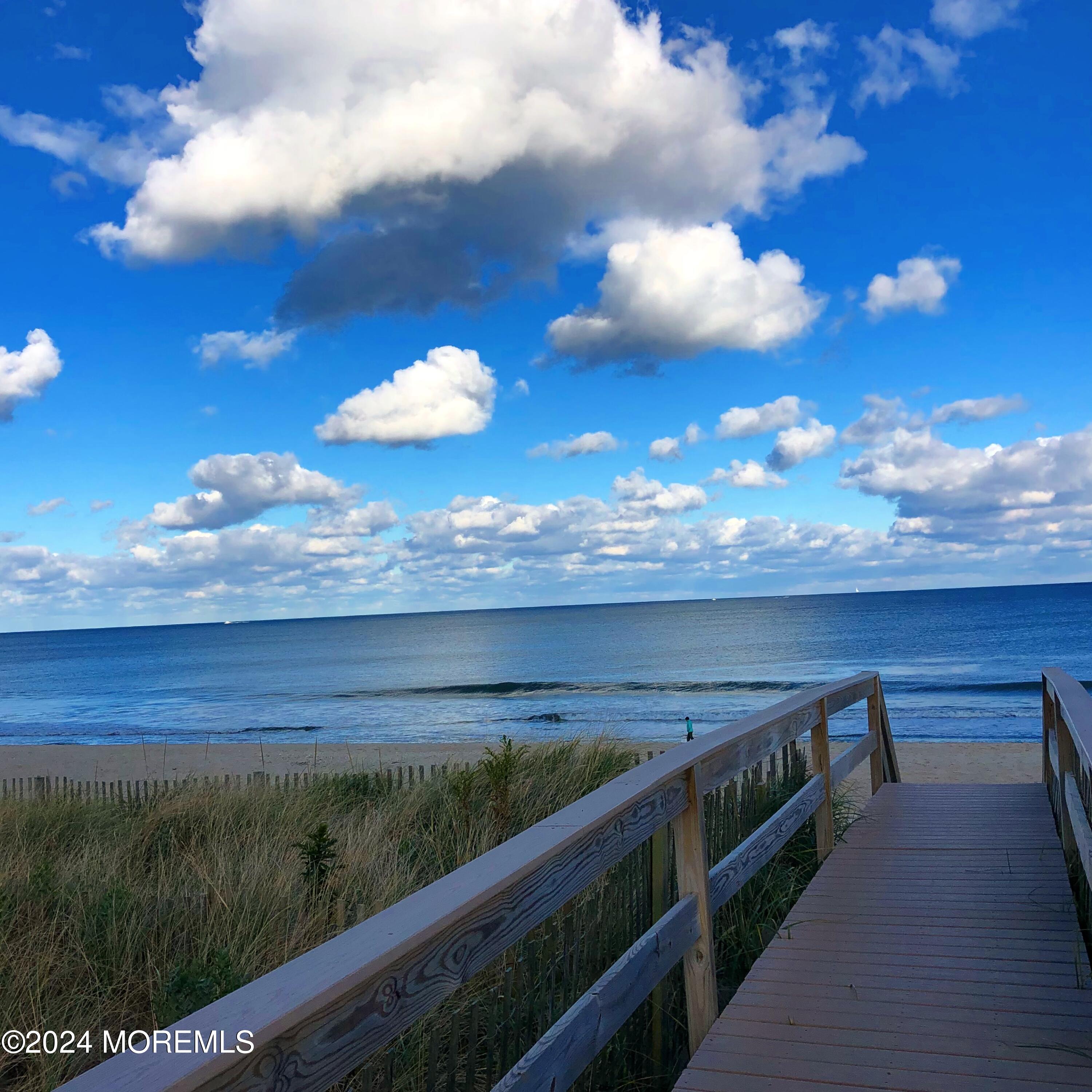 106 Mathis Place, Unit PO243 Mantoloking, NJ 08738 - Photo 22 of 25 a view of a balcony with an outdoor space