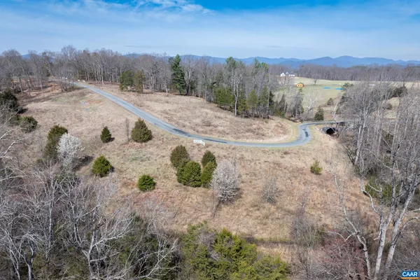 a view of a backyard of a house