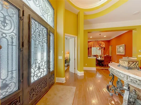 a kitchen with a sink a counter top space and stainless steel appliances