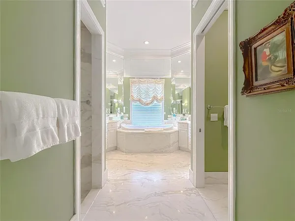 a view of a swimming pool with a yard