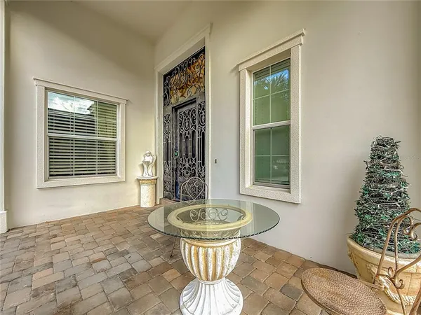 a living room with furniture and a table