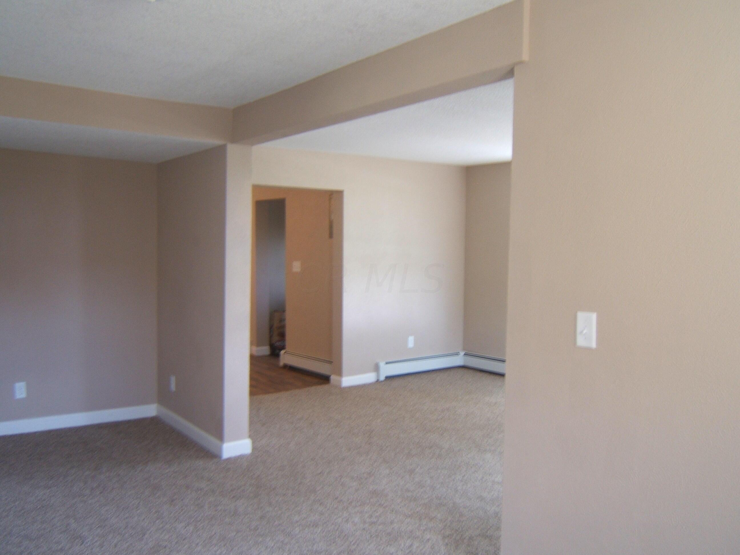L799 Co Road Grelton, OH 43523 - Photo 7 of 25 Living room view of kitchen doorway