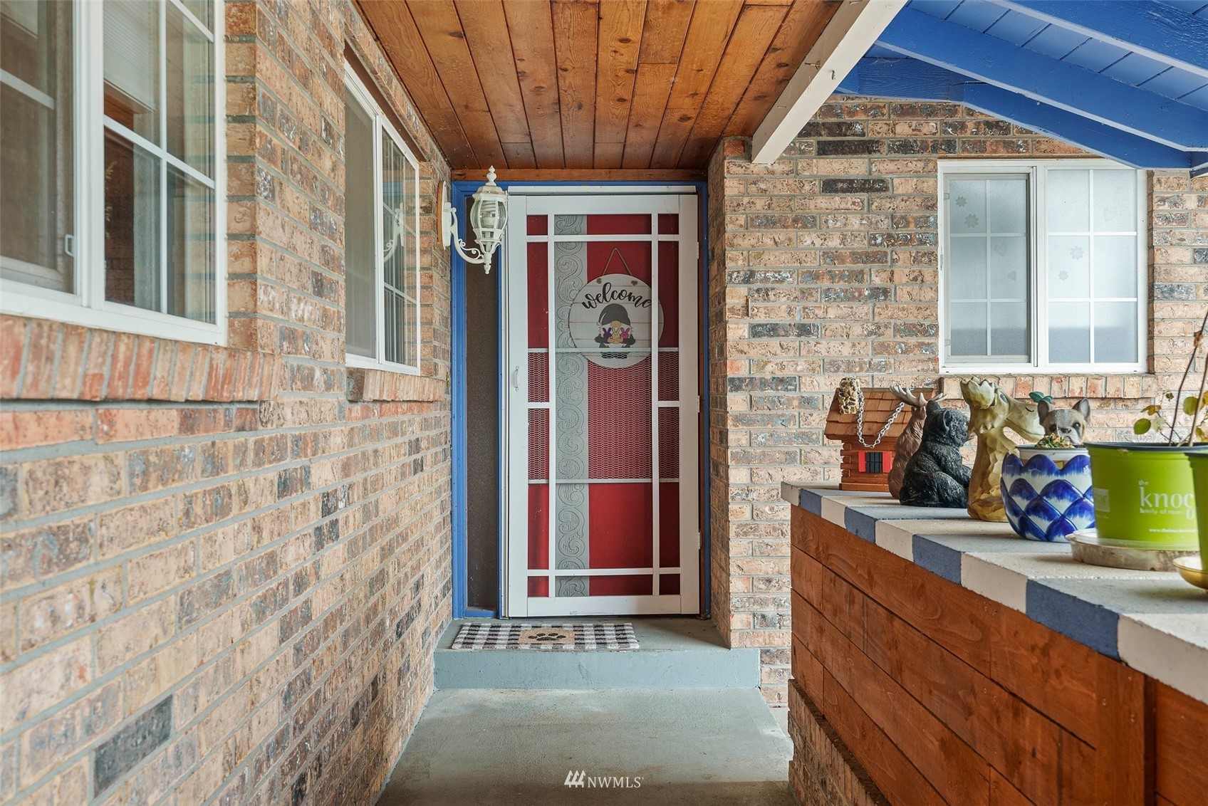 1652 Bishop Road Chehalis, WA 98532 - Photo 5 of 31 a view of a brick house with red door