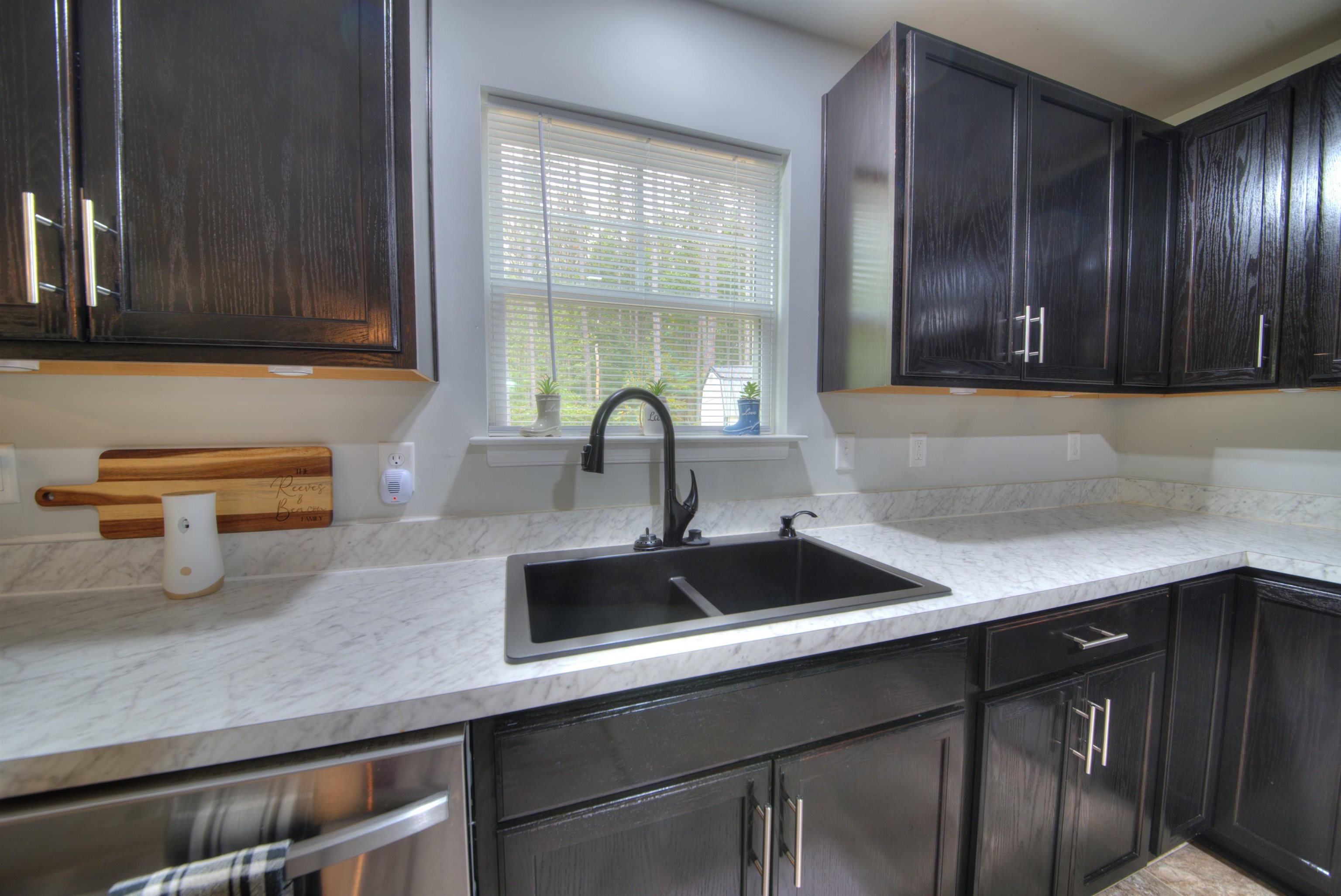 2635 Bumpass Road Bumpass, VA 23024 - Photo 26 of 38 a kitchen with a sink and a window