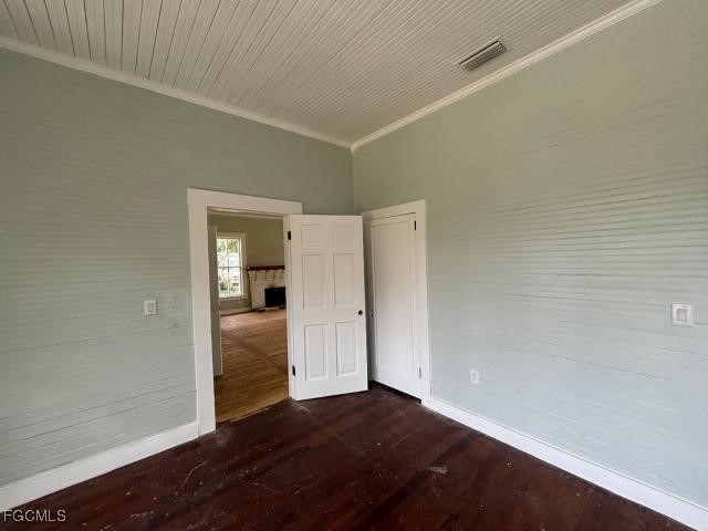 2326 Clifford Street Fort Myers, FL 33901 - Photo 11 of 21 a view of an empty room with wooden floor and a window