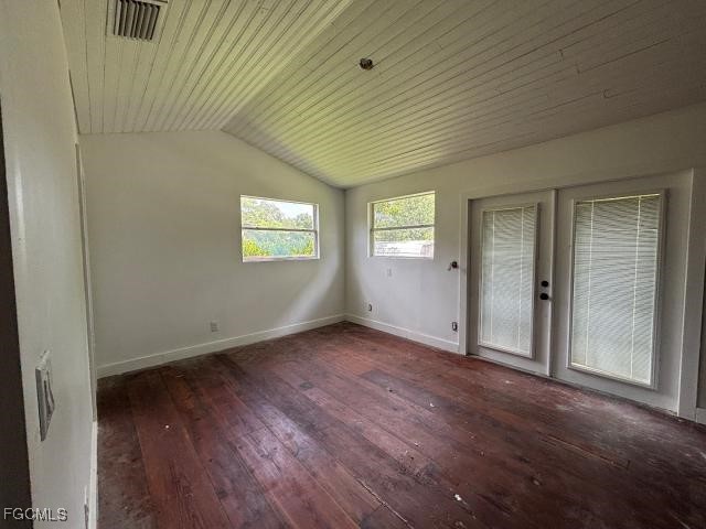 2326 Clifford Street Fort Myers, FL 33901 - Photo 18 of 21 an empty room with wooden floor and windows
