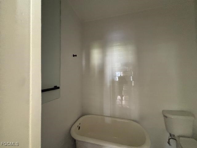 2326 Clifford Street Fort Myers, FL 33901 - Photo 21 of 21 a bathroom with a bathtub and toilet