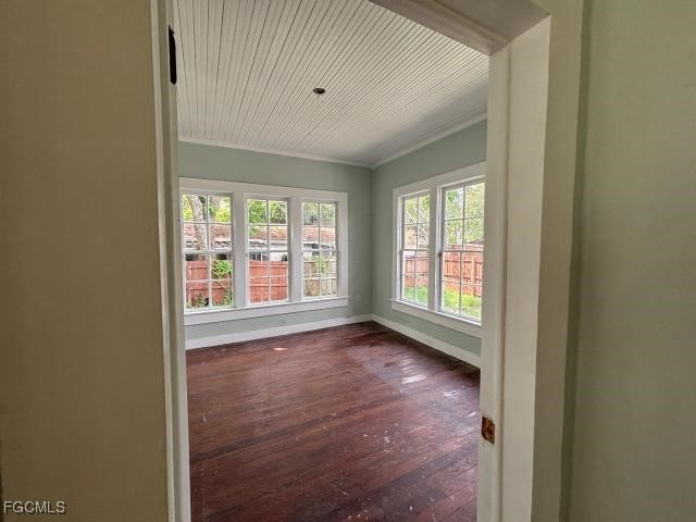 2326 Clifford Street Fort Myers, FL 33901 - Photo 10 of 21 a view of an empty room with a window and wooden floor