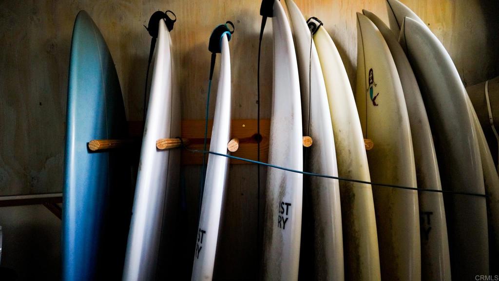 1761 Greentree Road Encinitas, CA 92024 - Photo 16 of 20 a view of walk in closet with clothes