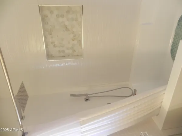 a bathroom with a bathtub