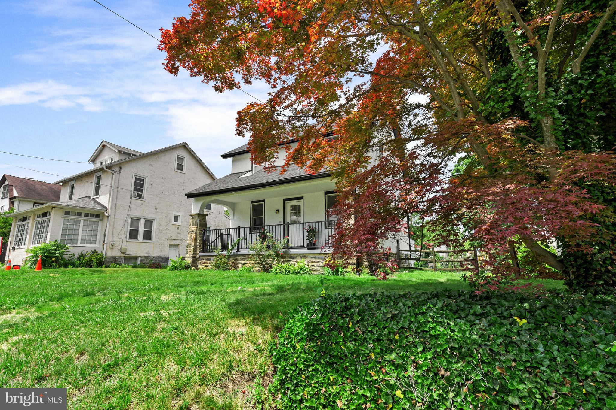 1082 Edge Hill Road Abington, PA 19001 - Photo 3 of 37 a front view of house with yard and green space