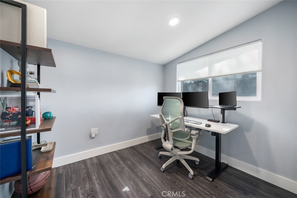 403 Beech Street Arroyo Grande, CA 93420 - Photo 16 of 46 a workspace with furniture and wooden floor