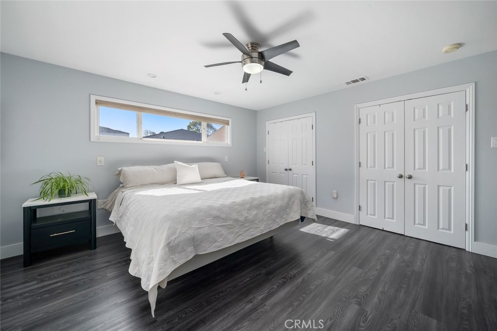 403 Beech Street Arroyo Grande, CA 93420 - Photo 17 of 46 a bedroom with a bed and a window