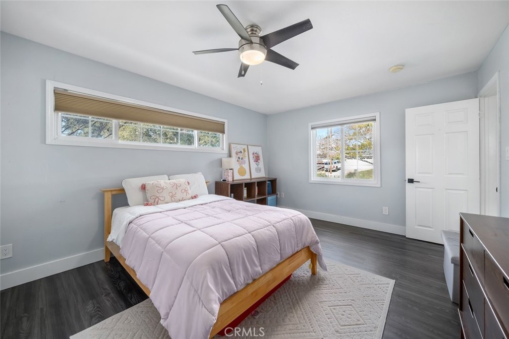 403 Beech Street Arroyo Grande, CA 93420 - Photo 21 of 46 a bedroom with a bed and a window