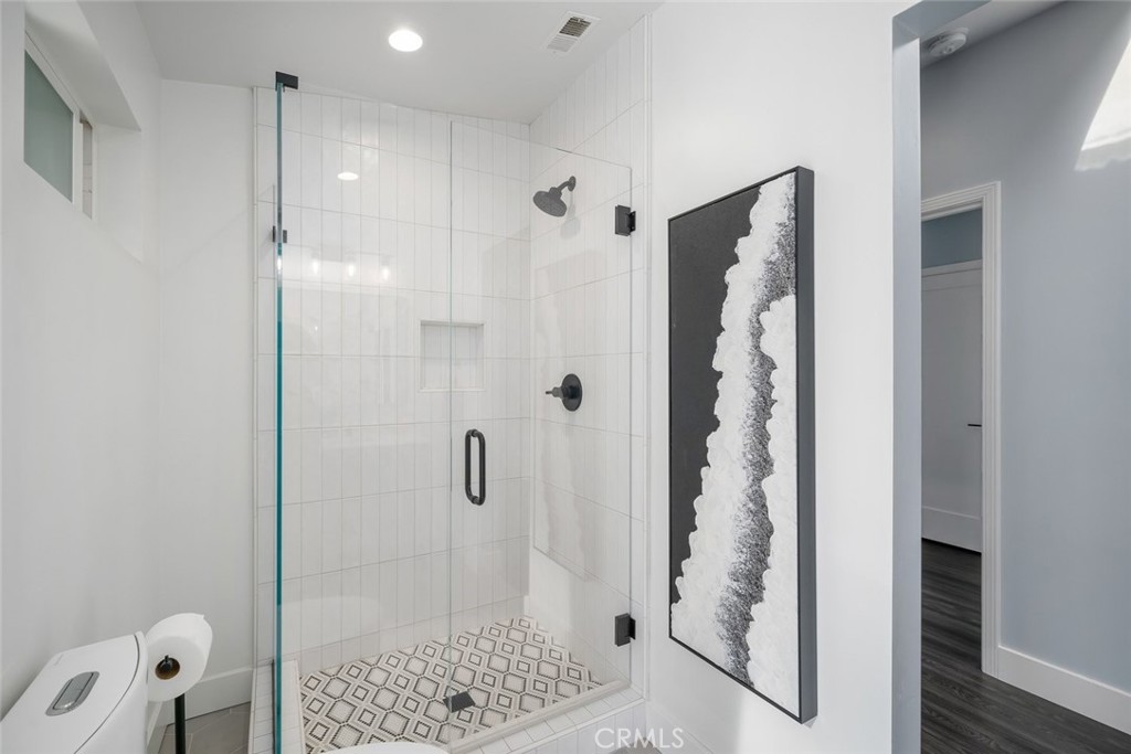 403 Beech Street Arroyo Grande, CA 93420 - Photo 27 of 46 a bathroom with a shower and a tub