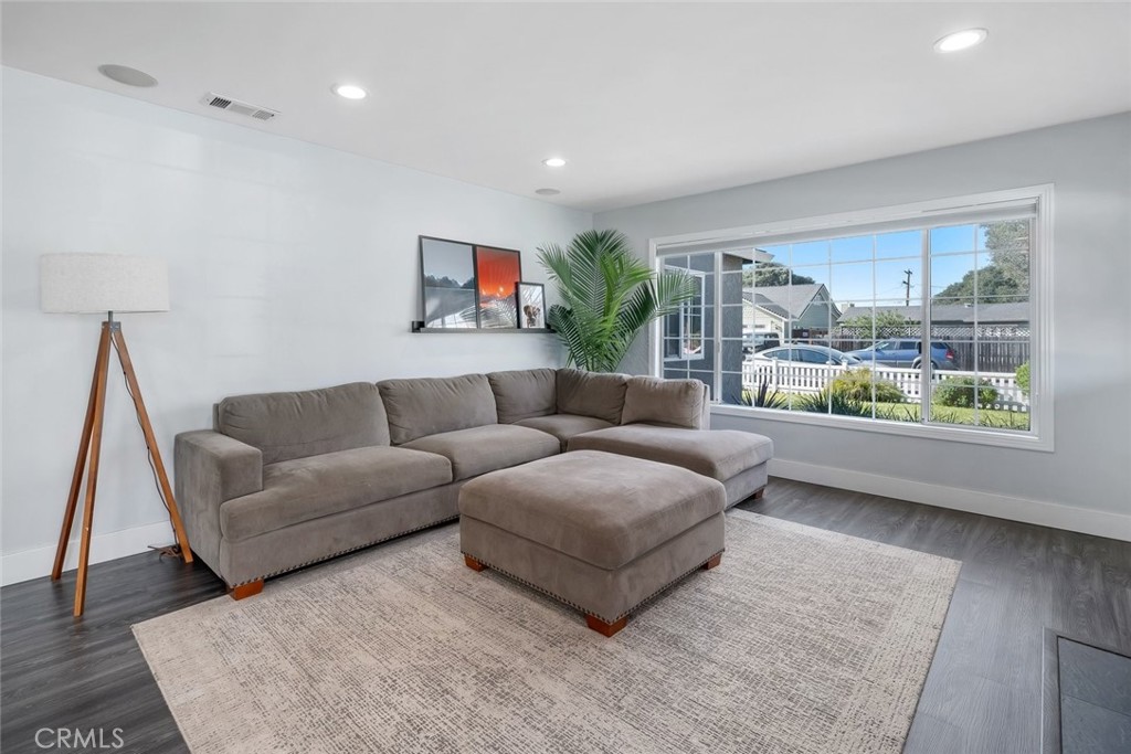 403 Beech Street Arroyo Grande, CA 93420 - Photo 5 of 46 a living room with furniture and a large window