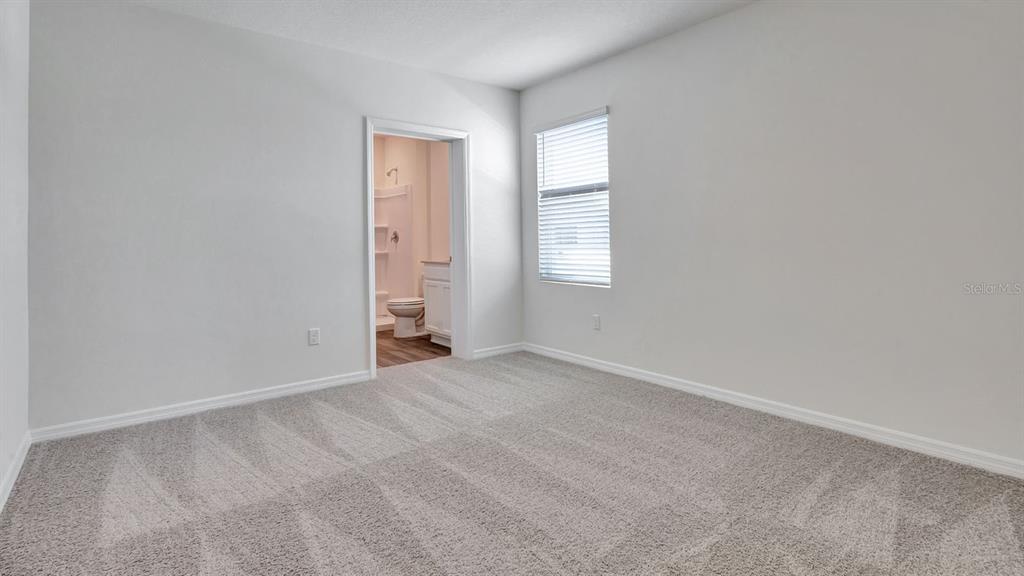 3598 Roden Road Haines City, FL 33844 - Photo 15 of 26 an empty room with windows