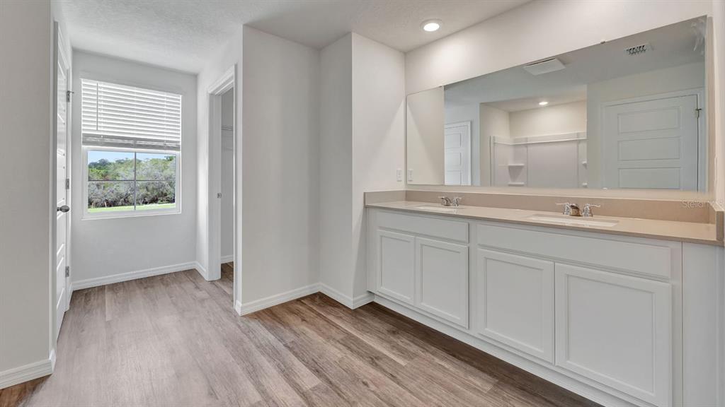 3598 Roden Road Haines City, FL 33844 - Photo 20 of 26 a view of a sink and a mirror