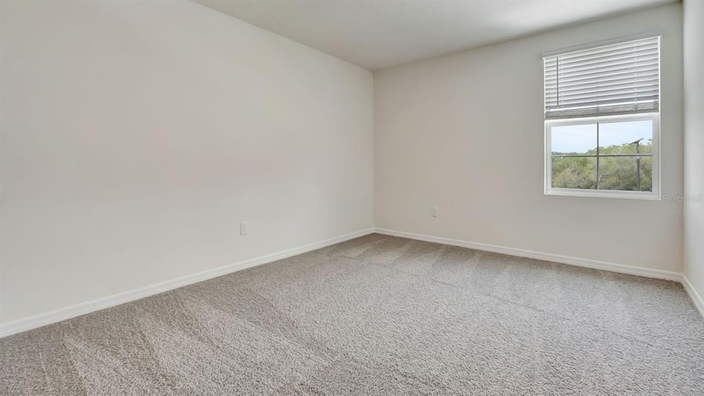 3598 Roden Road Haines City, FL 33844 - Photo 23 of 26 an empty room with a window