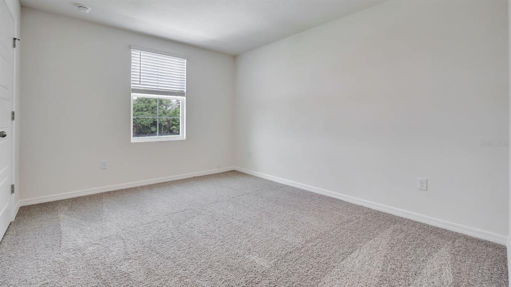 3598 Roden Road Haines City, FL 33844 - Photo 26 of 26 an empty room with windows