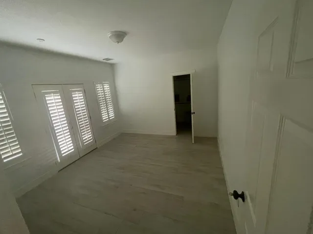 a view of a livingroom with natural light