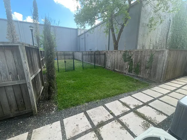 a view of a backyard with a garden