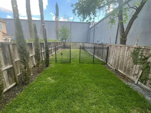 a bathroom with a sink and shower