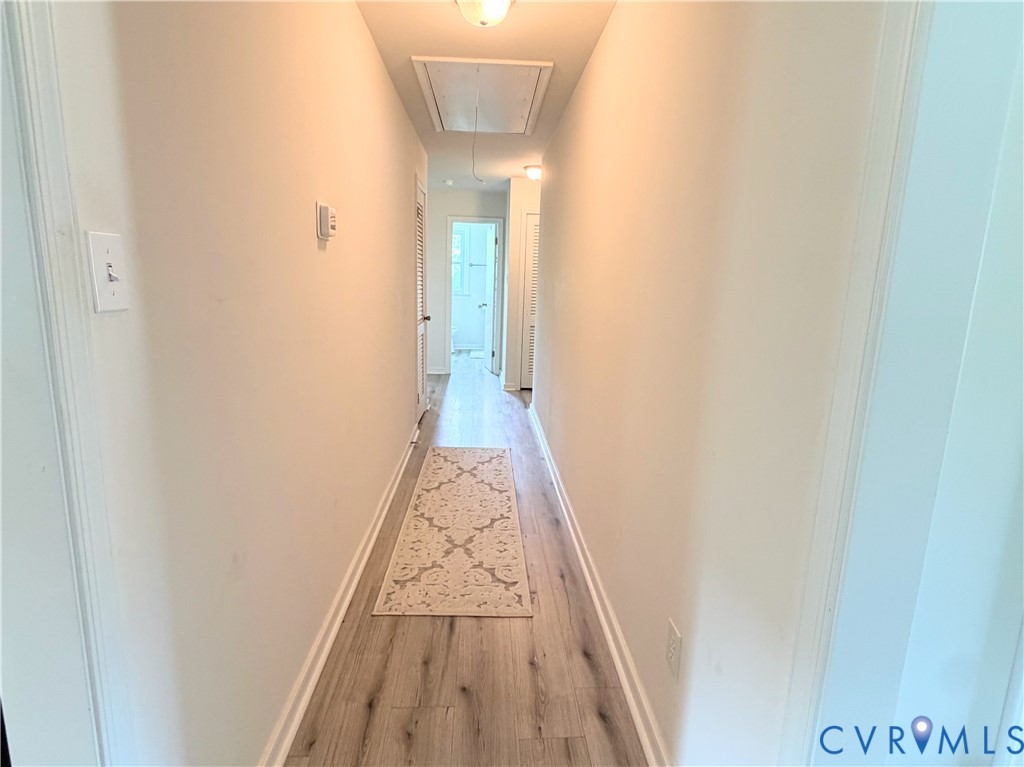 7547 Media Park Road Henrico, VA 23231 - Photo 7 of 21 Hallway featuring, light-toned walls, and a ceilin