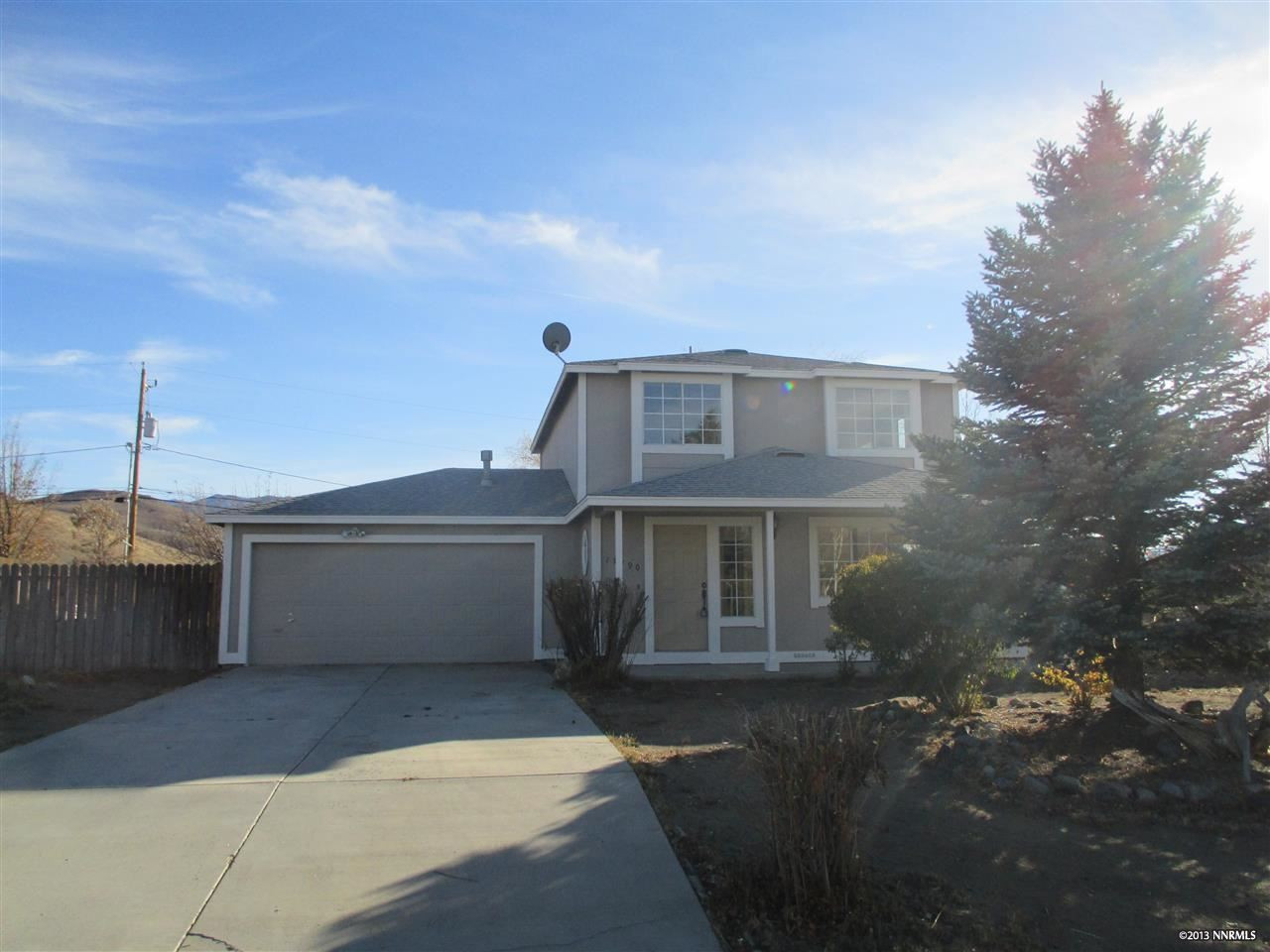 17190 Touraco Street Reno, NV 89508 - Photo 1 of 1 a front view of a house with a garage
