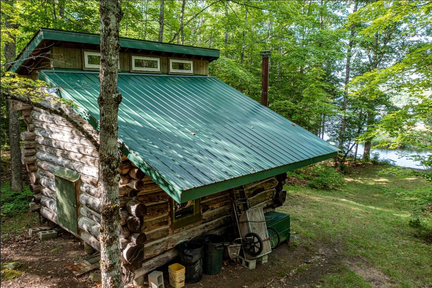 Off McCarthy Road Waterville, ME 04901 - Photo 5 of 23 6 Aerial of cabin toward fire ring