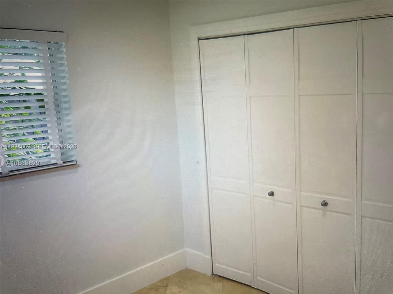 10900 Southwest 107th Avenue Miami, FL 33176 - Photo 19 of 26 a view of an empty room