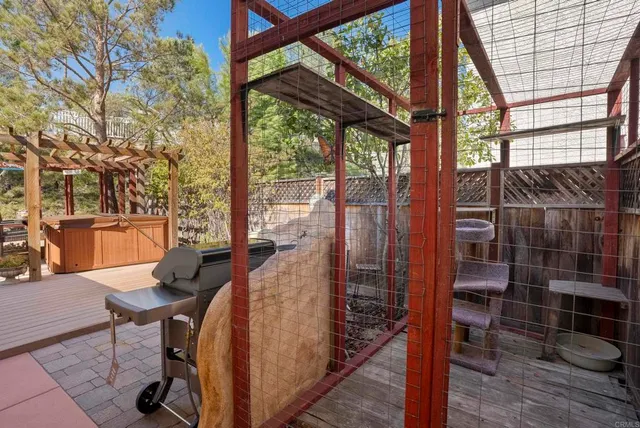 a view of a living room with furniture and a window