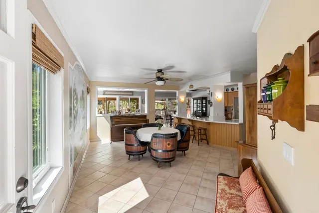 a living room with fireplace furniture and a flat screen tv
