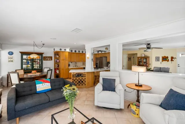 a living room with furniture and a table