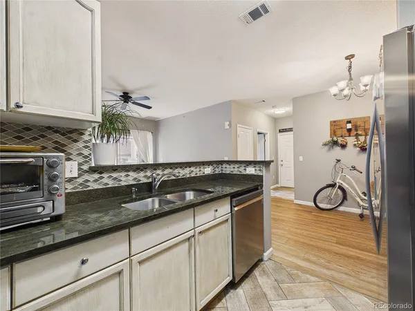 a kitchen with a stove and a microwave