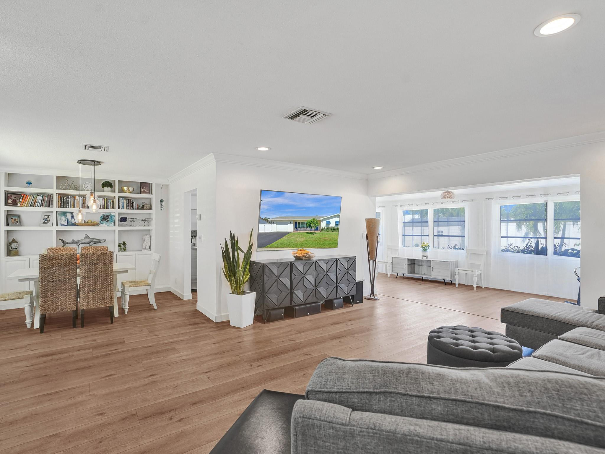 1119 Southwest 14th Street Boca Raton, FL 33486 - Photo 9 of 43 a living room with furniture and wooden floor