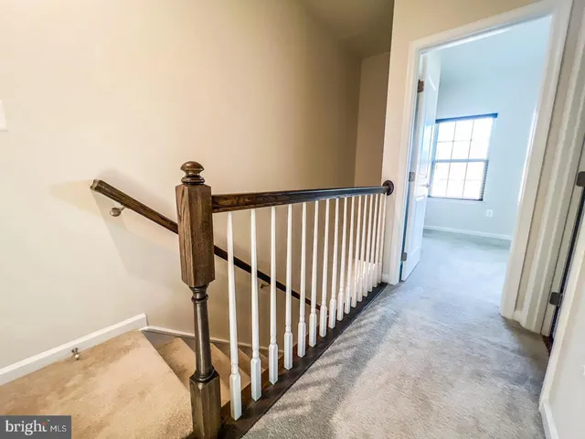a view of a hallway with window