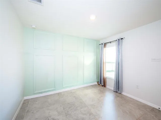 a workspace with furniture and a window