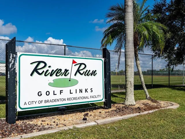 a view of a golf course with a garden