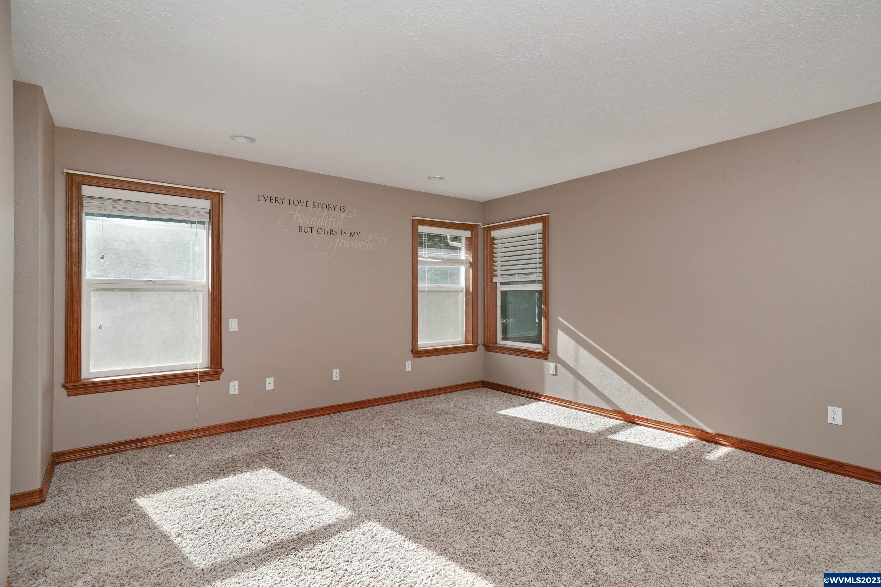 16570 Oakdale Road Dallas, OR 97338 - Photo 24 of 41 an empty room with windows