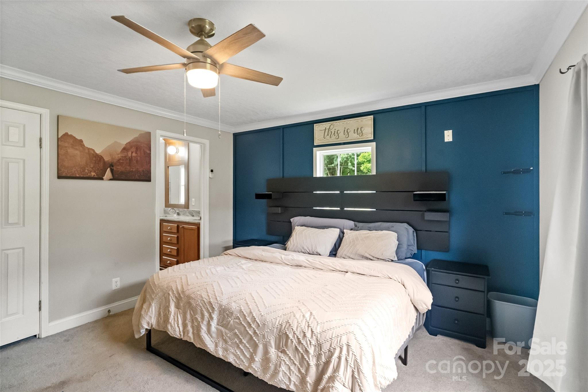 2021 Beamguard Road Clover, SC 29710 - Photo 15 of 33 a bedroom with a bed and a painting on the wall