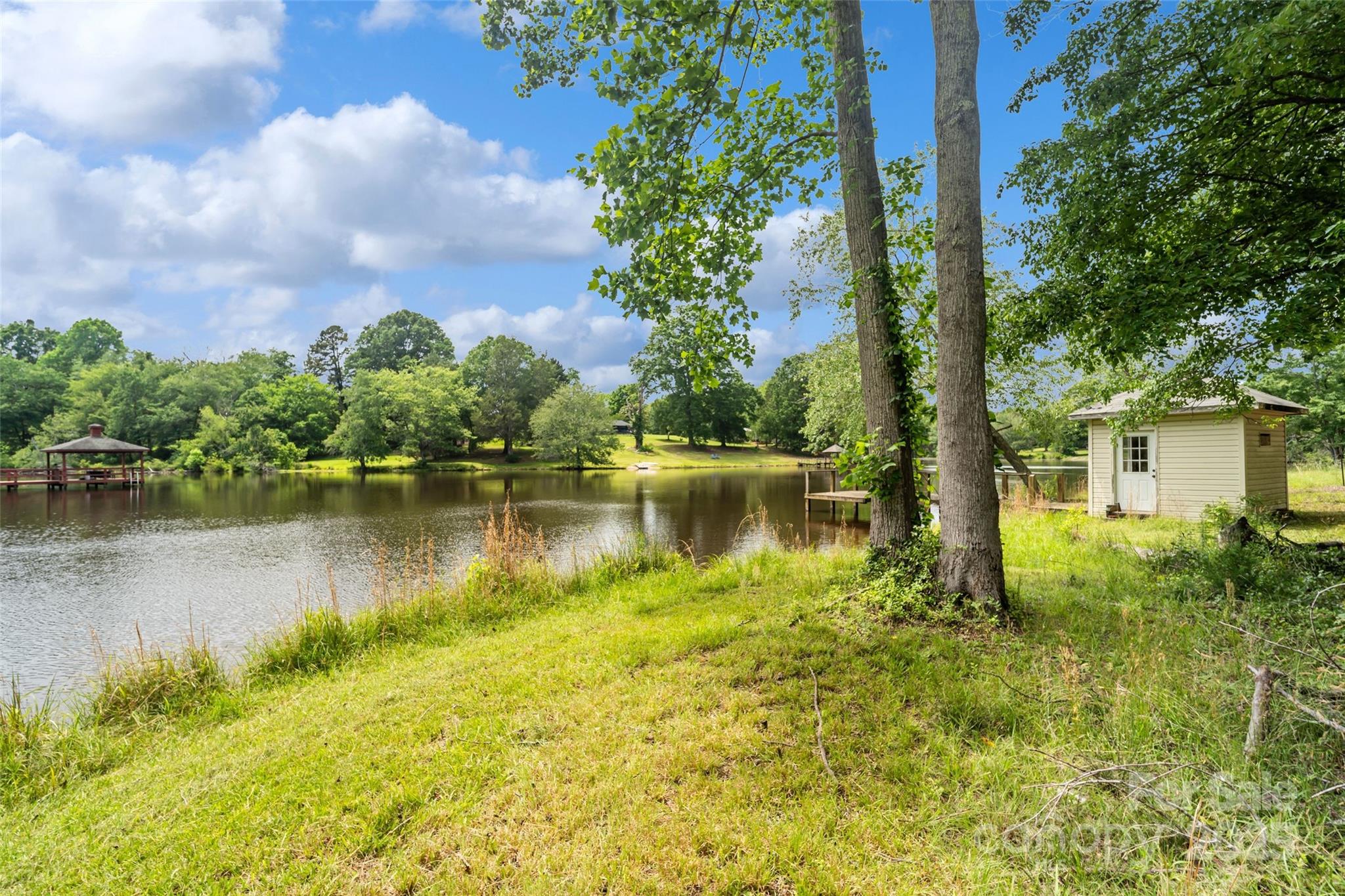 2021 Beamguard Road Clover, SC 29710 - Photo 19 of 33 a view of a large body of water surrounded by trees