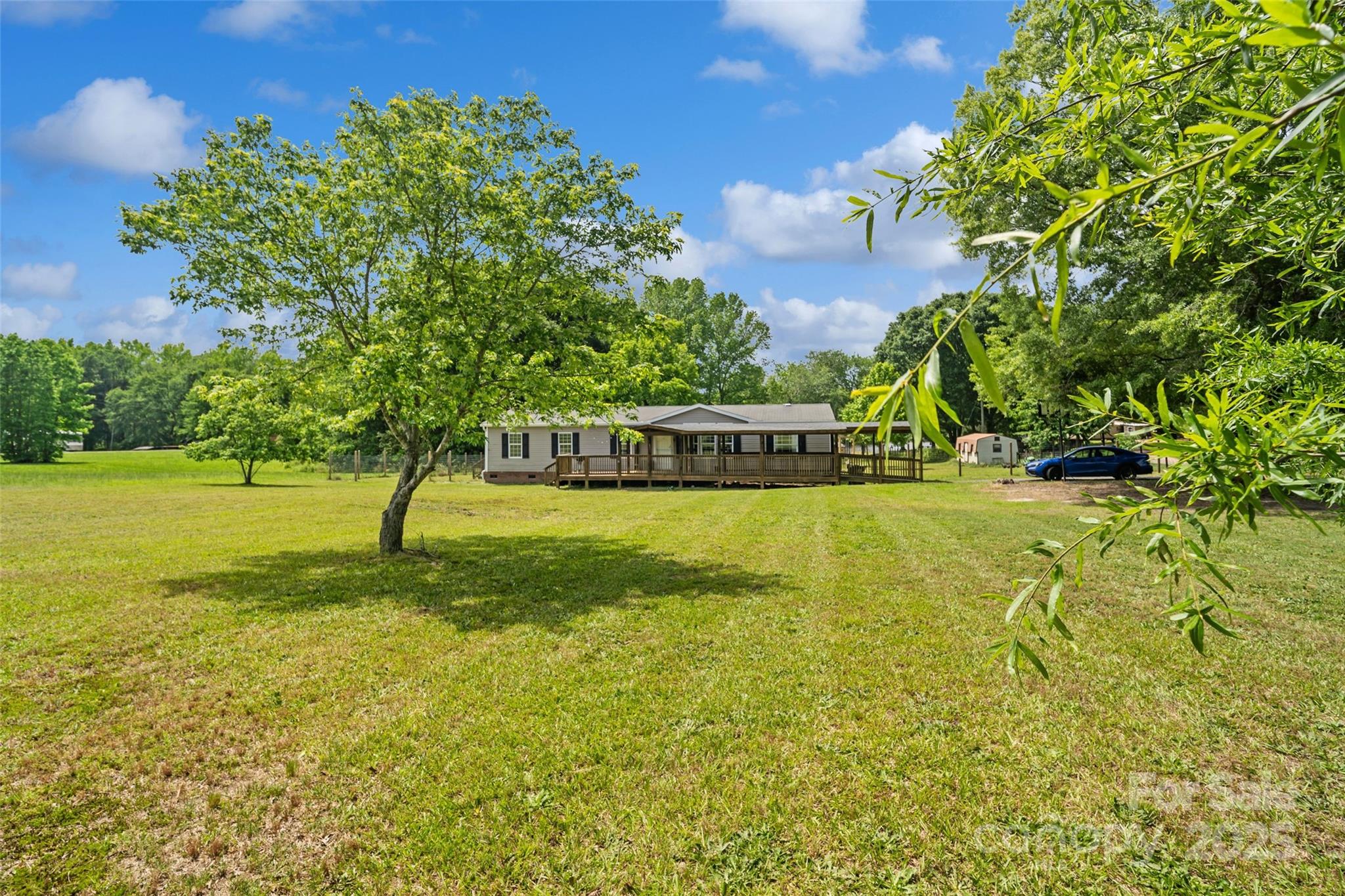 2021 Beamguard Road Clover, SC 29710 - Photo 2 of 33 a view of a yard with a house